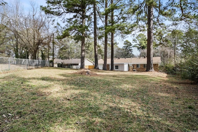 view of yard featuring fence