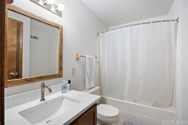 full bathroom with shower / bath combo, visible vents, vanity, and toilet