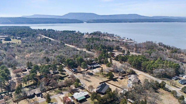 bird's eye view with a water and mountain view