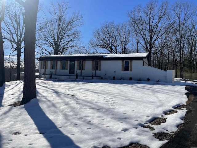 view of front of property featuring brick siding