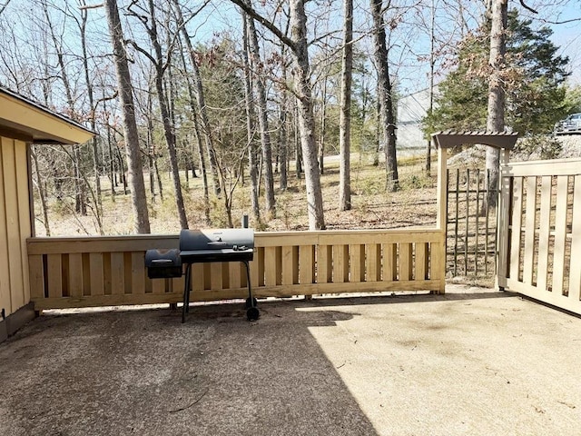 exterior space with grilling area and a patio