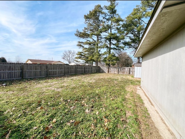 view of yard featuring a fenced backyard