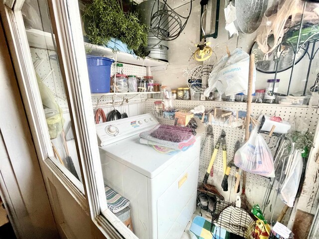 laundry room featuring laundry area and washer / clothes dryer