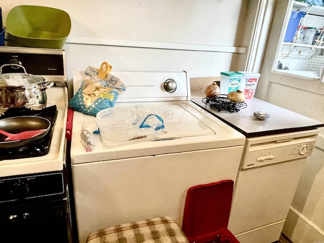 interior space with washing machine and dryer