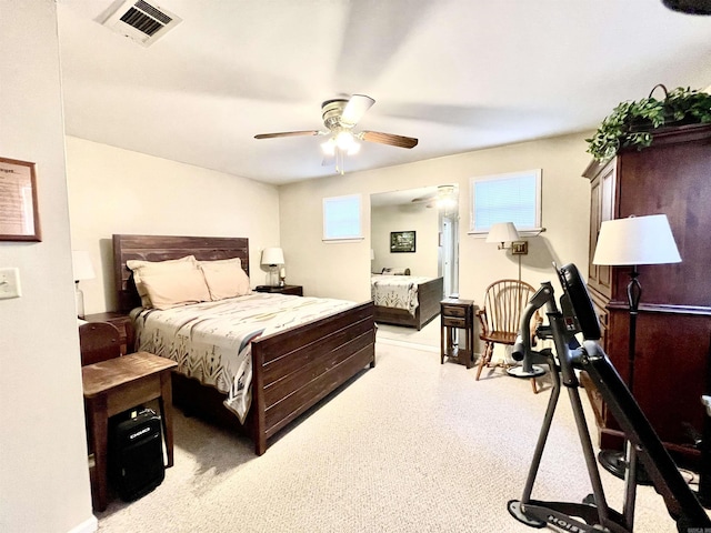 bedroom with visible vents and ceiling fan