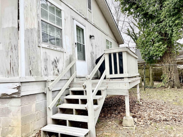 property entrance with fence