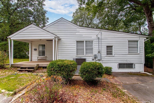 view of front of home featuring covered porch and central AC unit