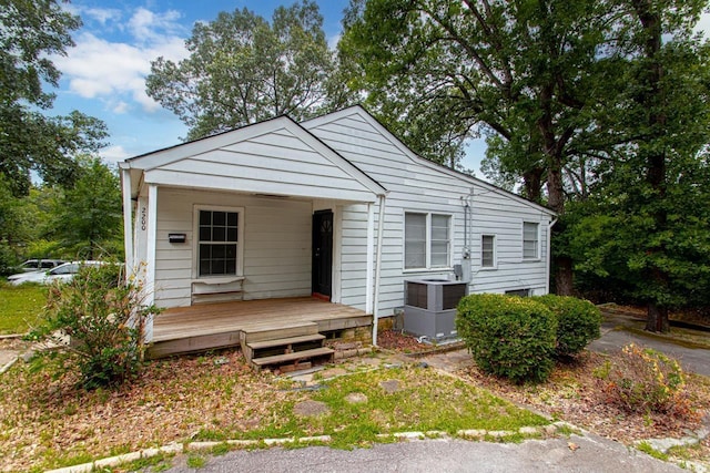 view of front facade featuring a porch and central air condition unit