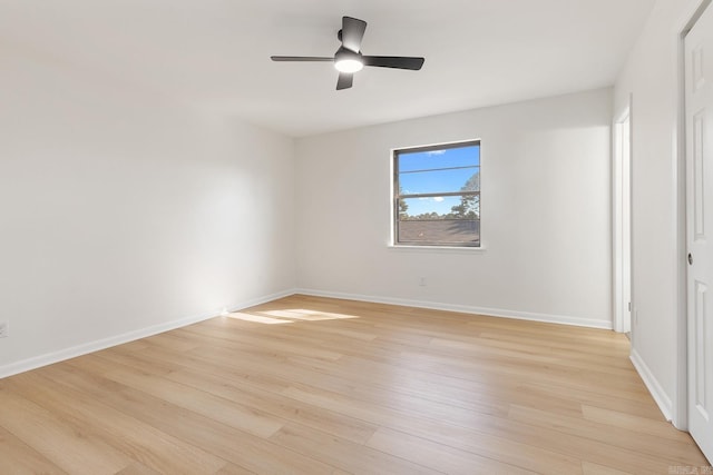 unfurnished bedroom featuring light wood-type flooring, ceiling fan, and baseboards