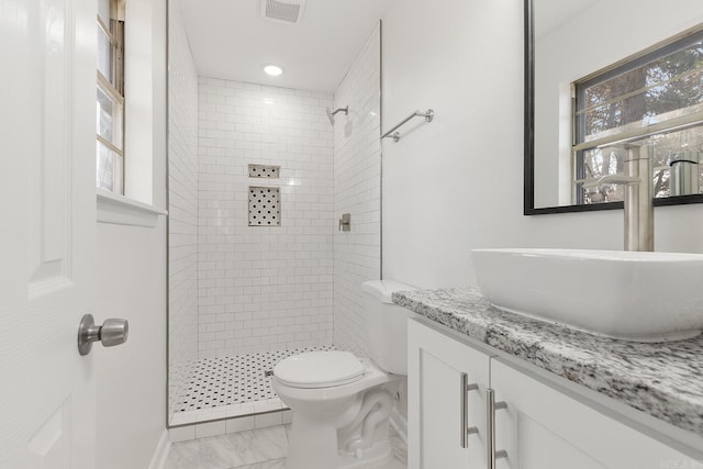 full bath featuring visible vents, toilet, marble finish floor, vanity, and a shower stall