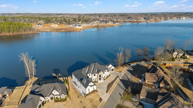 bird's eye view with a water view and a residential view