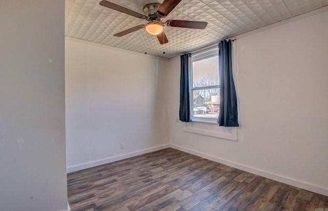 1612 Ridge Rd, El Paso, AR 72045 - unfurnished room featuring wood finished floors, a ceiling fan, and baseboards