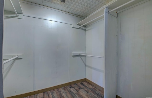 1612 Ridge Rd, El Paso, AR 72045 - spacious closet featuring wood finished floors