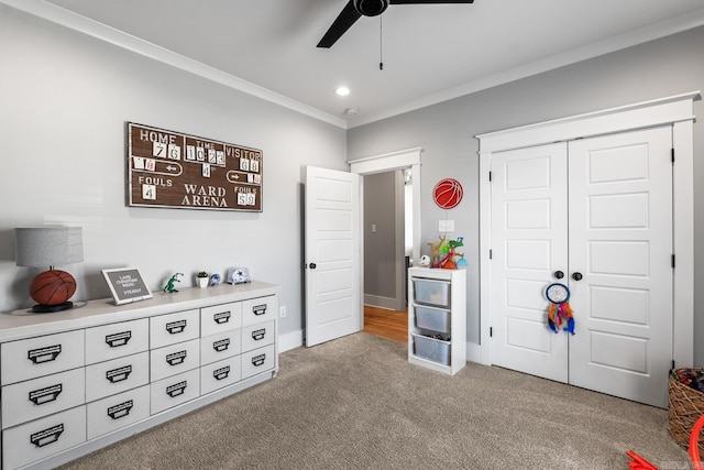 interior space with baseboards, ceiling fan, crown molding, a closet, and recessed lighting