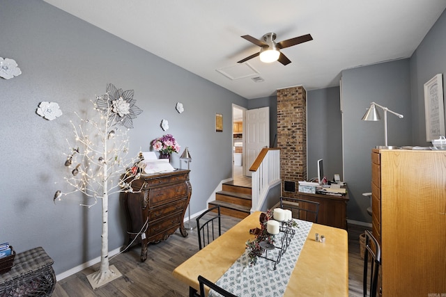 bedroom featuring a ceiling fan, attic access, baseboards, and wood finished floors