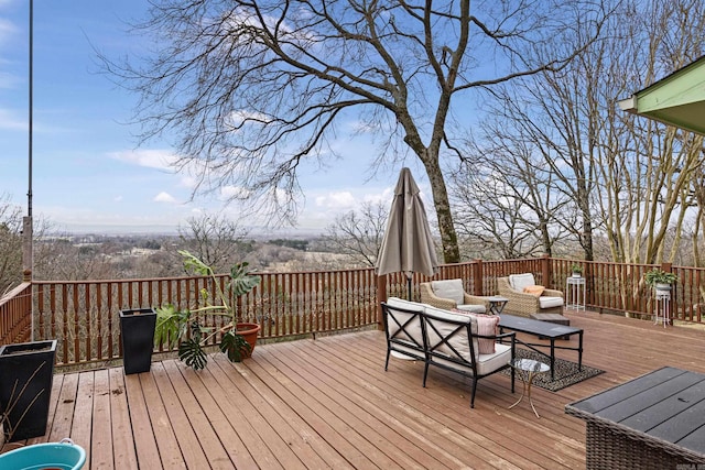 wooden deck with an outdoor living space