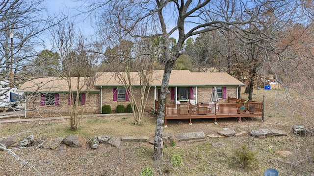 ranch-style house featuring a deck