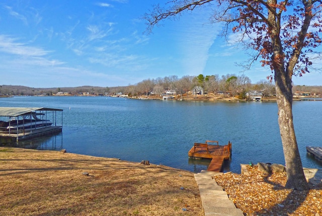 view of dock with a water view