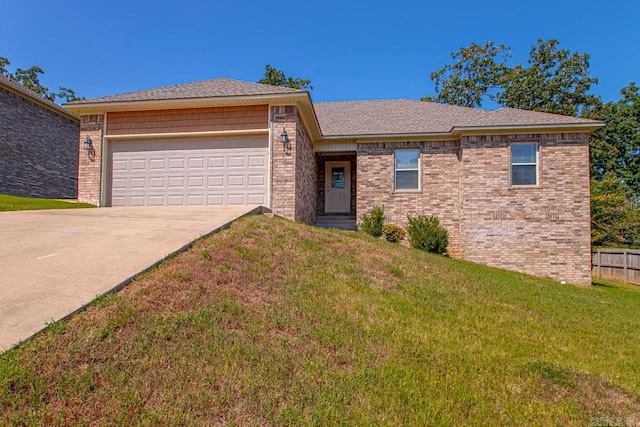 ranch-style house featuring a garage, brick siding, fence, driveway, and a front yard