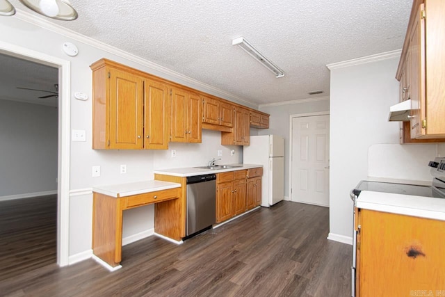 kitchen featuring appliances with stainless steel finishes, dark wood-style flooring, light countertops, crown molding, and a sink