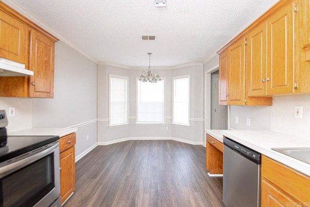 kitchen with visible vents, appliances with stainless steel finishes, light countertops, and dark wood finished floors