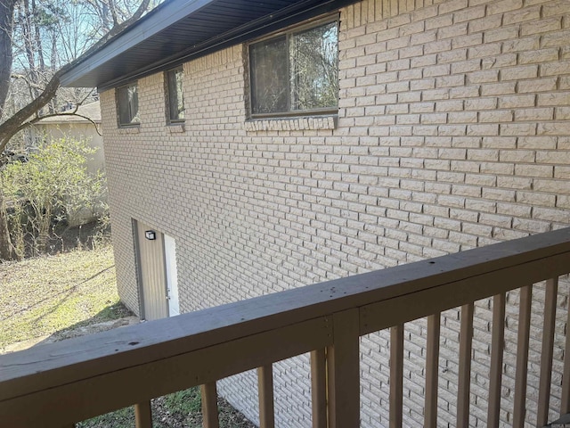 view of home's exterior with brick siding