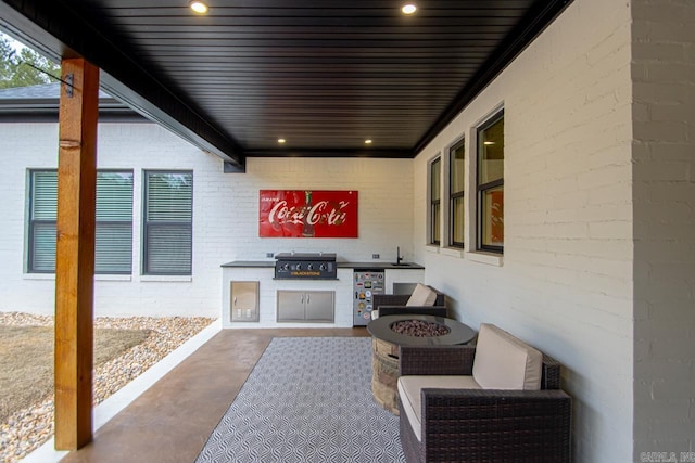 view of patio with exterior kitchen and area for grilling