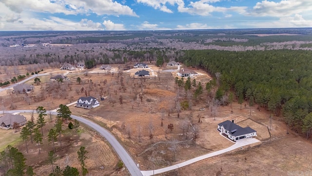 drone / aerial view with a forest view