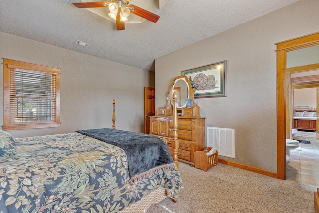 bedroom with carpet floors, lofted ceiling, visible vents, and baseboards