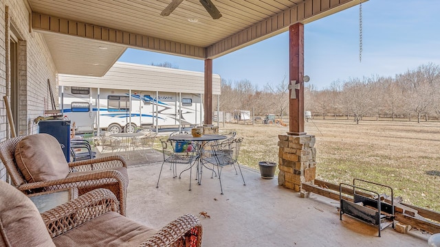 view of patio featuring a ceiling fan