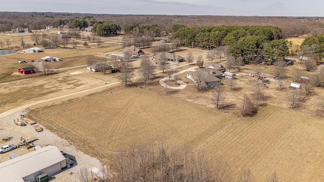 birds eye view of property featuring a rural view