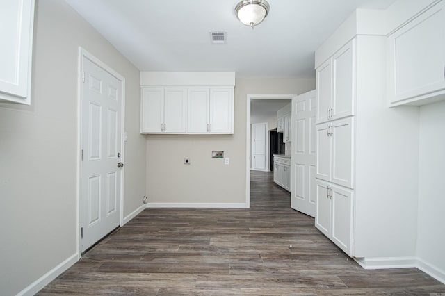 414 W Padgett Rd, El Dorado, AR 71730 - laundry room with baseboards, visible vents, dark wood-style flooring, and hookup for an electric dryer