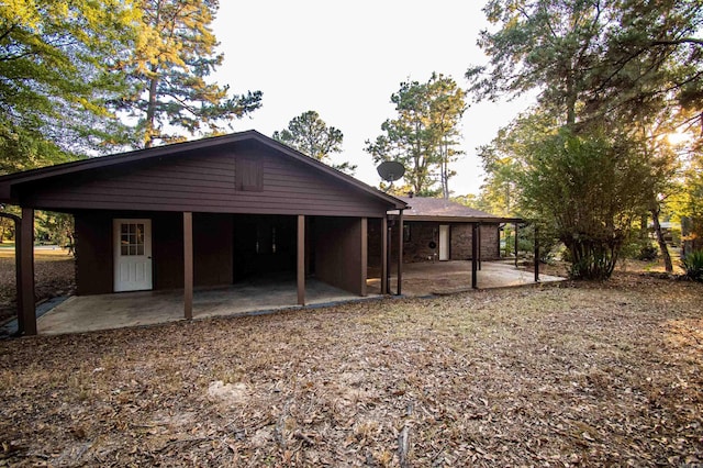 414 W Padgett Rd, El Dorado, AR 71730 - rear view of property featuring a patio