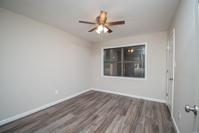 414 W Padgett Rd, El Dorado, AR 71730 - spare room featuring a ceiling fan, a textured ceiling, baseboards, and wood finished floors