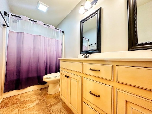 full bathroom featuring toilet and vanity