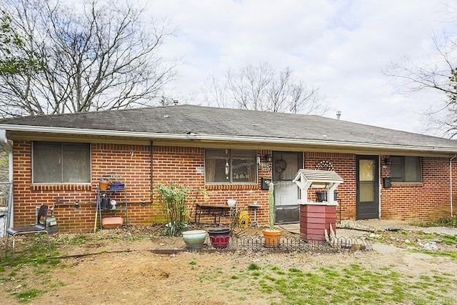 view of front of house with brick siding