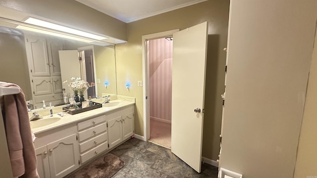 121 W Lee St, Mineral Sprs, AR 71851 - bathroom featuring crown molding, a sink, baseboards, and double vanity
