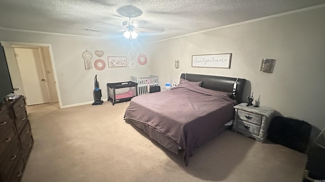 121 W Lee St, Mineral Sprs, AR 71851 - bedroom featuring baseboards, light colored carpet, ceiling fan, ornamental molding, and a textured ceiling