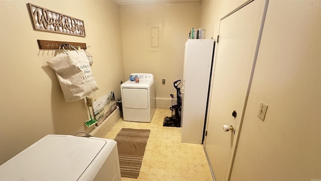 121 W Lee St, Mineral Sprs, AR 71851 - clothes washing area featuring laundry area, light floors, washing machine and clothes dryer, and electric panel