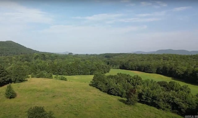 exterior space with a view of trees