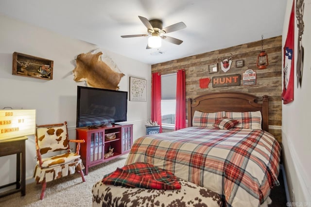 carpeted bedroom with visible vents and a ceiling fan