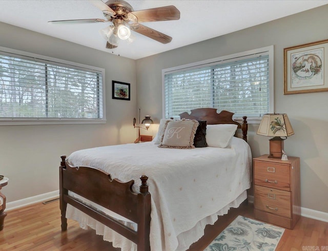121 Chappel Hill Rd, Hot Springs, AR 71913 - bedroom featuring light wood finished floors, multiple windows, visible vents, and baseboards