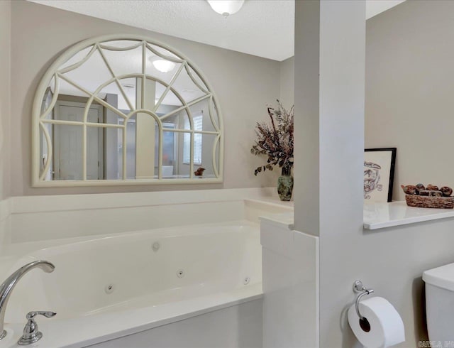 121 Chappel Hill Rd, Hot Springs, AR 71913 - full bath with a tub with jets and a textured ceiling