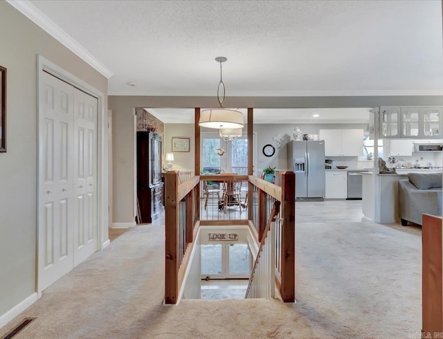 121 Chappel Hill Rd, Hot Springs, AR 71913 - dining area with light colored carpet, visible vents, baseboards, and ornamental molding