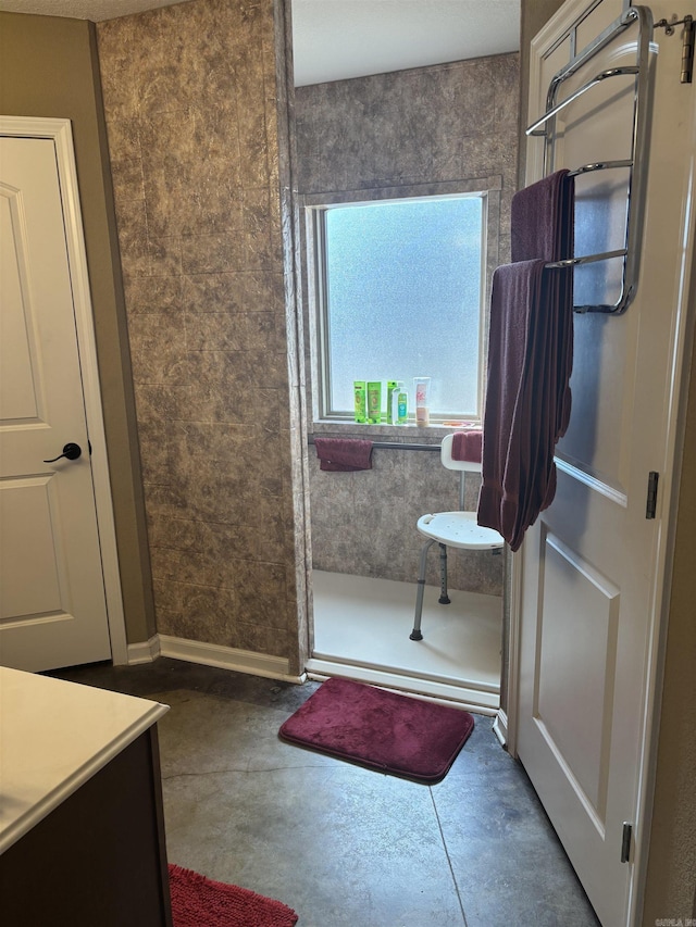 bathroom with baseboards