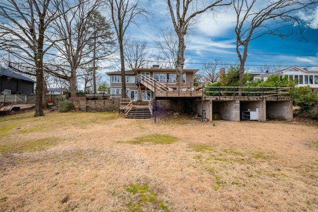 view of yard with stairway and a wooden deck