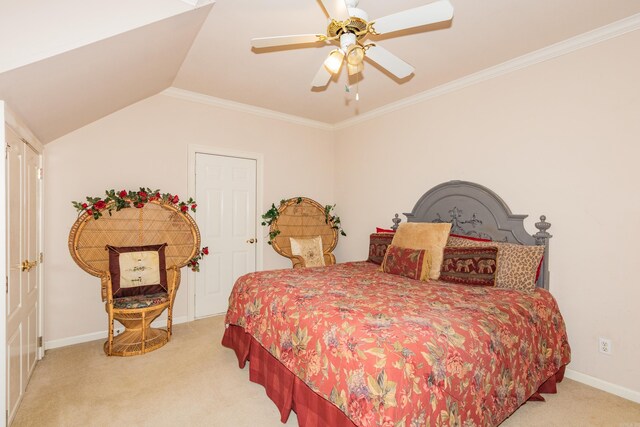 carpeted bedroom with ceiling fan, crown molding, baseboards, and vaulted ceiling