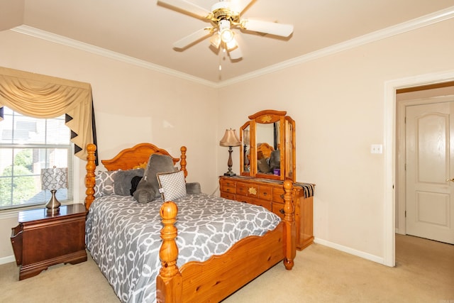 bedroom featuring crown molding, carpet, baseboards, and ceiling fan