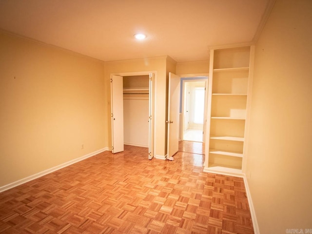 unfurnished bedroom with ornamental molding, recessed lighting, a closet, and baseboards