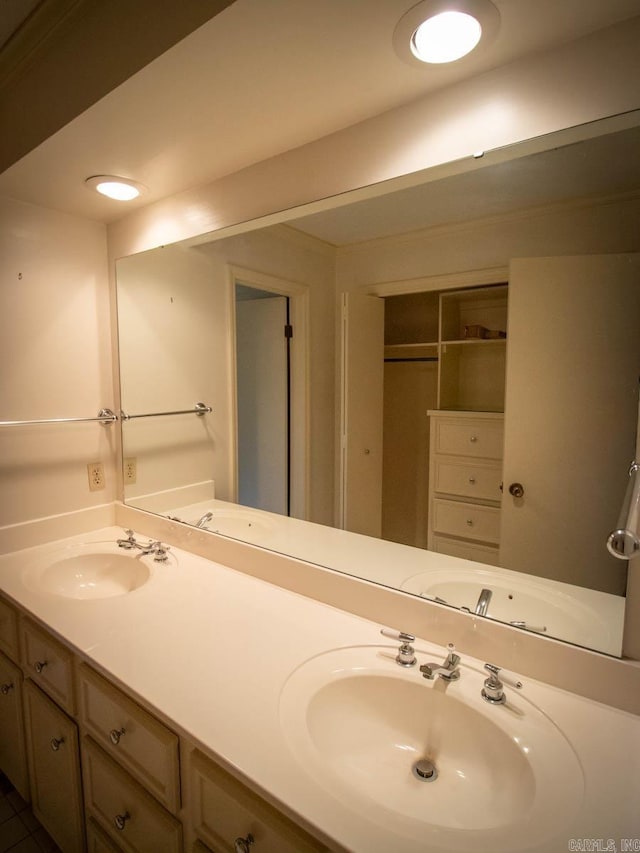 bathroom featuring double vanity and a sink